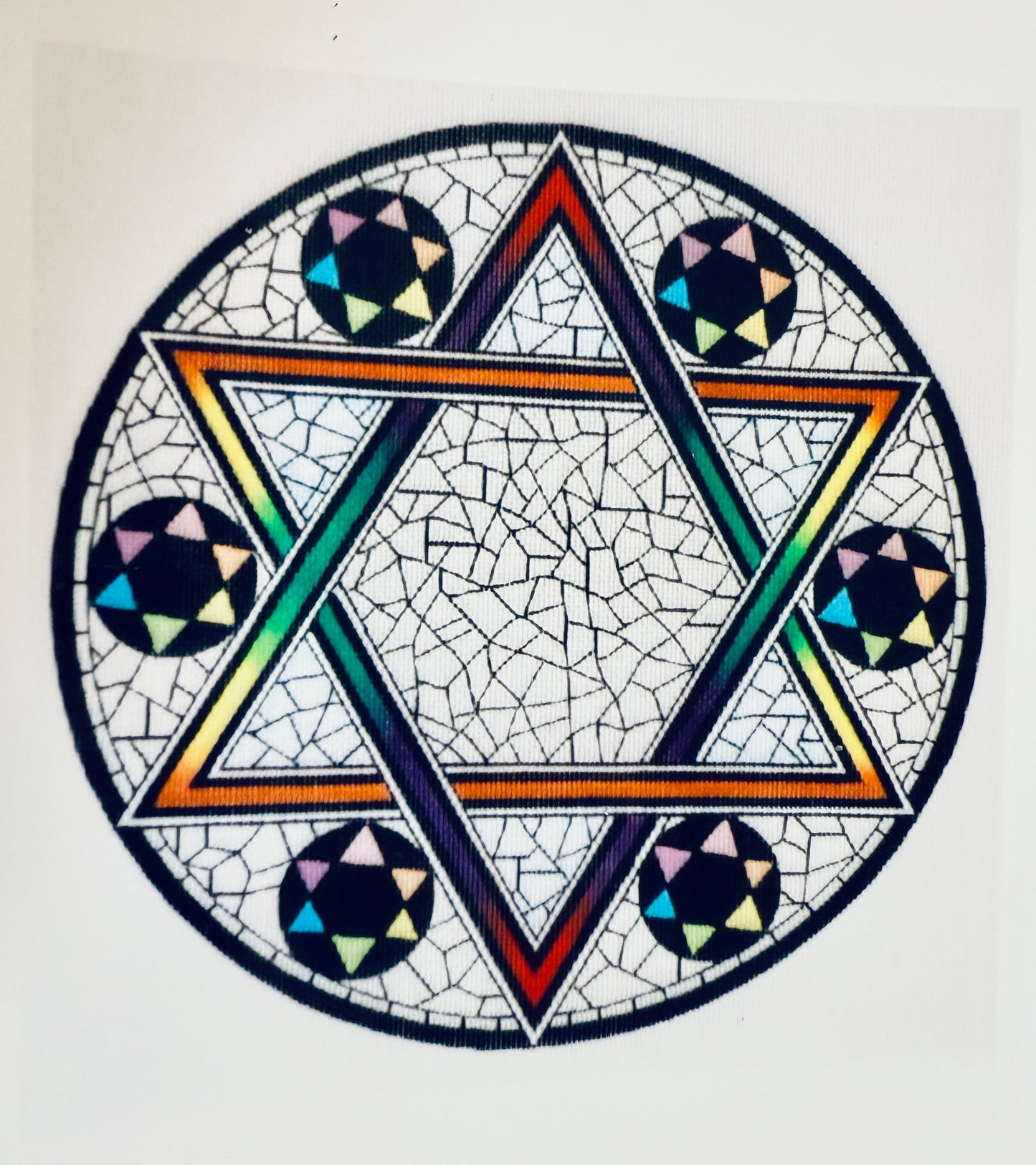 Star on stained glass window in the round