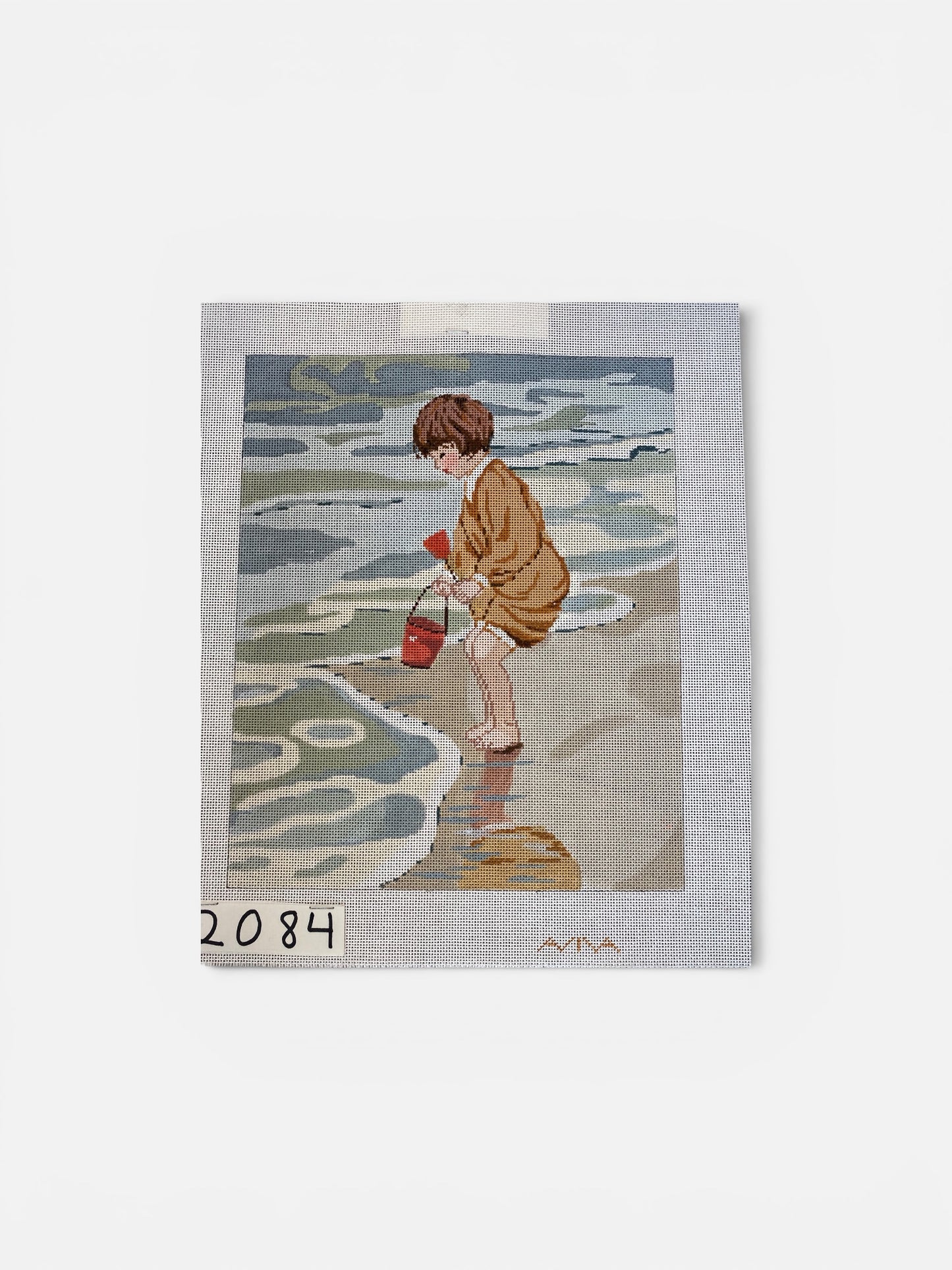 Beach girl with a shovel