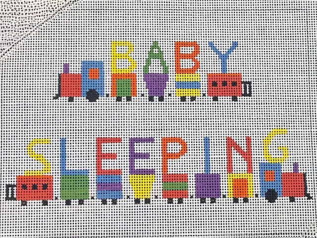 Baby Sleeping with Trains